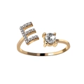 Adjustable rose gold letter E ring featuring a sparkling round crystal and pavé stones - Letter E