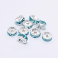 Silver spacer beads with blue rhinestones for DIY jewelry making and craft projects - 4mm / Sky Blue Zirconia
