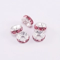 Silver spacer beads with pink rhinestones for DIY jewelry making in a set of four - 4mm / Pink Zirconia