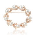 Elegant rose gold circular brooch featuring white pearls and rhinestone encrusted leaves - No. 28-Rose Gold Circle Wreath