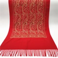 Detailed close-up of red cashmere-feel scarf with golden paisley embroidery and tassels - Red