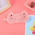 Close-up of pink plush cat sleep mask with soft faux fur texture and embroidered eyes - Pink Fox / Pink