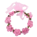 Close-up of pink artificial roses and delicate green leaves on a floral headband - Pink