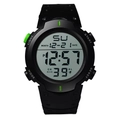 Detail view of large digital watch face showing luminous display and functional buttons - 601 Green