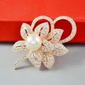 Gold-tone floral brooch with central pearl and white crystal accents, size 5.5x4.0cm - No. 21-Gold Large Pearl Flower