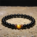 Men's volcanic stone bracelet with a yellow tiger eye bead and coconut wood spacers - Black Lava Stone + Yellow Cat Eye + Wood (FD0183)