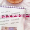 Pink washi tape with cherry pattern displayed on an open book for journaling - 8# Cherry