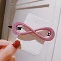 Chic pink infinity symbol hair clip with smooth resin finish and black metal duckbill grip - Large Infinity Shape / Purple Pink