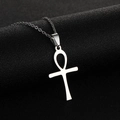 Polished silver stainless steel Ankh cross pendant necklace on a black textured background - Ankh Cross / Steel