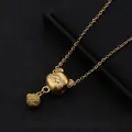 Detailed close-up of a gold-plated mouse pendant on a titanium steel cross chain - Rich Mouse Necklace