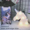 Mini LED unicorn night light in white plastic with warm yellow glow, 10x15cm size - White Unicorn Head