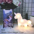 Mini unicorn LED night light in white matte plastic with warm glow, size 12cm by 11cm - White Pony