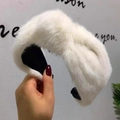 Detailed view of the soft white faux rabbit fur texture and knotted design on headband - White