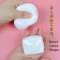 White silicone squeeze stress relief toy showing high elasticity and anti-deformation - Tofu Squeeze Toy