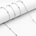 Catena a sfere in argento lucido presentata in un avvolgimento multistrato - Catena d'Argento Perla d'Argento