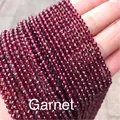 Perline in granato naturale sfaccettato rosso scuro tenute in mano per fare gioielli - Granato 3mm