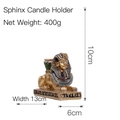 Golden Sphinx candle holder in wood-color resin with detailed blue accents, 10x6x13cm - Sphinx Candlestick / H10cm L13cm W6cm