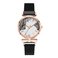 Detail of rose gold case and white dial with leaf print on Tadi quartz watch - Black