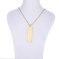 Polished gold rectangular tag pendant necklace on white mannequin with bead chain - Gold