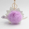 Detail of purple faux fur dinosaur keychain with holographic PU leather and gold clasp - Light Purple