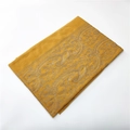 Close-up of yellow cashmere-like scarf showing intricate paisley embroidery detail - Ginger Yellow