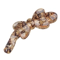 Detail of amber texture on a brown resin bow banana hair clip with glossy finish - Light Coffee Sprayed