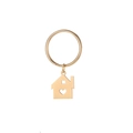 Detalle de llavero de casa dorada con diseño de corazón hueco sobre fondo blanco - Acero Inoxidable 304 (Chapado en Oro de 18K) / Dorado