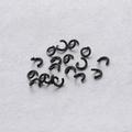 Detailed top view of bulk 1x5mm black stainless steel jump rings for jewelry making - Black (100Pcs/Pack)