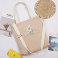 Beige corduroy shoulder bag with daisy embroidery and adjustable strap in a casual style - Off White