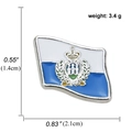 Detailed view of a San Marino flag metal lapel pin with crown and towers emblem - San Marino Wave Flag