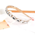 Diadema dorada con cristais rectangulares transparentes en un diseño elegante y fino - Strass Blanco Rectangular