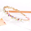 Close-up of golden alloy headband with sparkling teardrop-shaped AB color crystals - Teardrop Colorful Rhinestone
