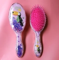 Set of two pink and purple sequin hairbrushes with cute cartoon toucan designs - 1822 Toucan