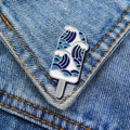 Japanese style popsicle brooch with blue ocean wave enamel detail on denim fabric - Sea Wave Popsicle