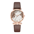 Women's quartz watch with rose gold case, brown leather strap, and palm leaf dial pattern - Brown