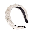 Detailed view of beige velvet twisted headband with faux pearls and silver beads detail - Beaded White