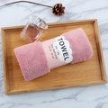 Pink coral fleece towel rolled in a wooden tray on a white marble background surface - 35*75cm / Dusty Pink