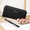 Women's black quilted PU leather long wallet with wristlet and gold zipper closure - Black