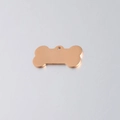 Polished rose gold bone-shaped stainless steel dog tag pendant with hanging hole - 16x31mm / Rose Gold