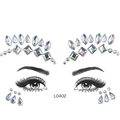 Detailed placement of holographic AB resin face jewels on eye and forehead outlines - L0402 Holographic AB