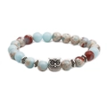 Close-up of owl beaded bracelet with Shoushan stone, blue sodalite, and vintage silver spacer - Owl