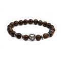 Close-up of tiger eye stone beads bracelet with a detailed silver lion head charm - Lion Head