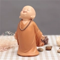 Laughing little monk figurine in orange robe with prayer beads for zen desk decor - 1034-4 Open Hands Laughing
