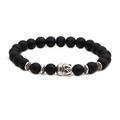 Detailed close-up of matte black agate beads with a silver Buddha head charm centerpiece - Buddha Head