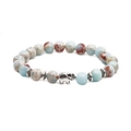 Detail of beaded bracelet featuring imperial stone beads and vintage silver elephant charm - Elephant