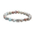 Detail of beaded bracelet showing natural stone textures and silver Buddha head charm - Buddha Head