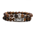 Detail view of tiger eye beaded bracelet set featuring silver crown lion head and vintage tube - Crown Lion Set
