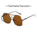 Piloot zonnebril met thee-kleurig metalen montuur en donkerbruine glazen - Thee Frame Thee Lenzen