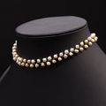 Double-layered fresh water pearl necklace with gold-plated base on a neck model - White