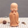 Cute resin monk figurine in yellow robe performing a prayer gesture for zen desk decor - 1034-2 Standing Praying